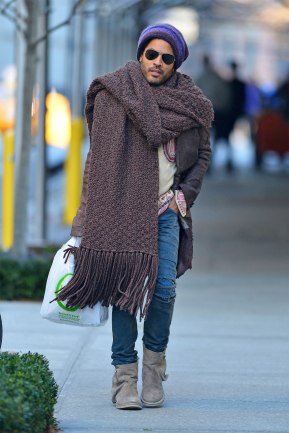 Lenny Kravitz fights the winter chill with a giant scarf and knit hat, as he goes out and about in New York City